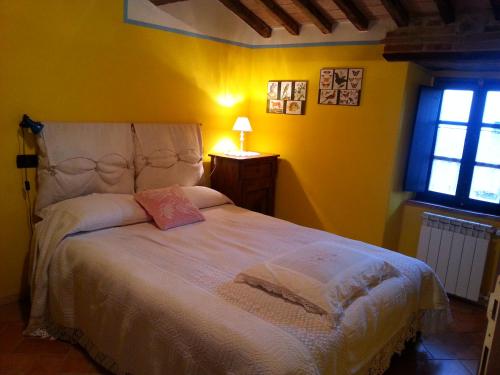 Postel nebo postele na pokoji v ubytování La Casa di Adelina