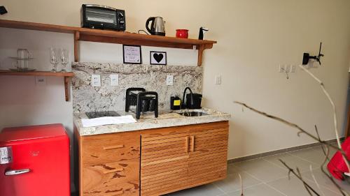 Η κουζίνα ή μικρή κουζίνα στο Residencial Mirante