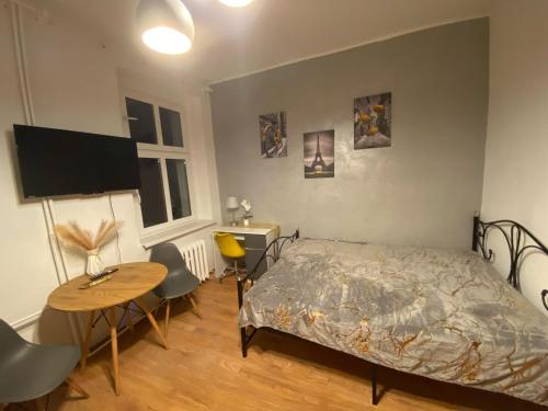 Postel nebo postele na pokoji v ubytování Magnolia Rooms Plus