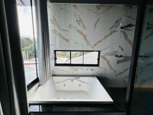 Imagen de la galería de Suíte Premium Hidro Prox Serra do Cipó - Sítio Araras Cipó, en Jaboticatubas