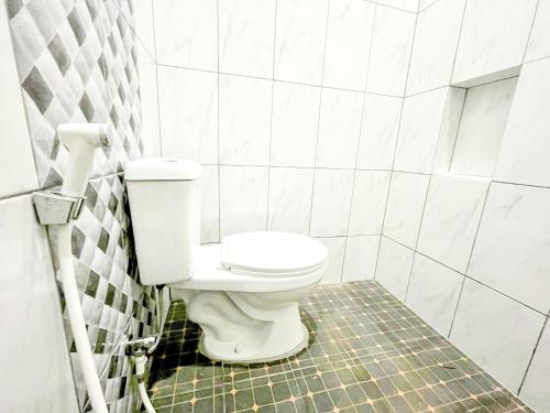 Koupelna v ubytování Sans Arya Hotel Batu