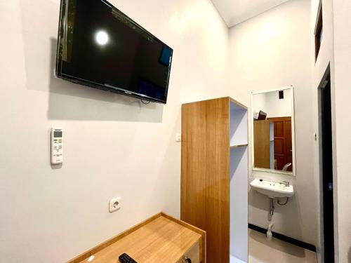 Koupelna v ubytování Sans Arya Hotel Batu