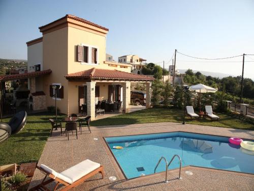 Bazén v ubytování Villa in Skouloufia with Private Pool & Views nebo v jeho okolí