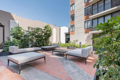 O zonă de relaxare la Luna's home depto equipado por Av Chapultepec