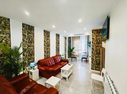 a living room with a couch and a table at Apartamento in Donostia-San Sebastián