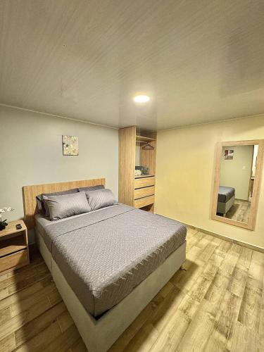 Postel nebo postele na pokoji v ubytování Hostelfc Santa Barbara