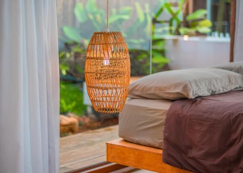 Postel nebo postele na pokoji v ubytování บ้านละอองฟ้า2 -Baan La Ong Fah 2