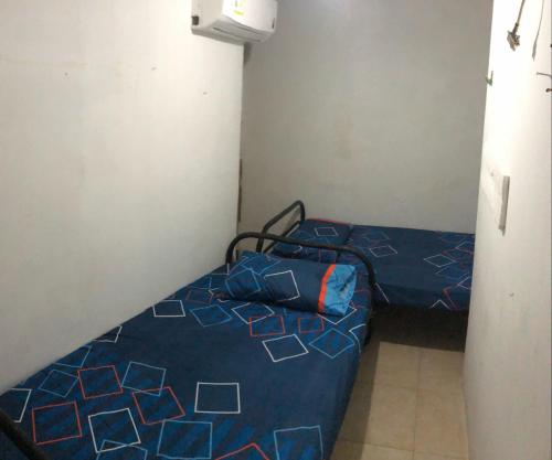 Postel nebo postele na pokoji v ubytování Casa Santorini II