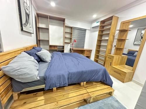 Postel nebo postele na pokoji v ubytování Olu's Condo