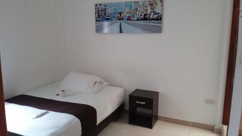 Katil atau katil-katil dalam bilik di Hotel Tramonti