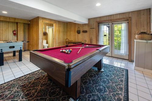 a billiard room with a pool table in it at Sweet Scarlet Rose cabin in Sevierville