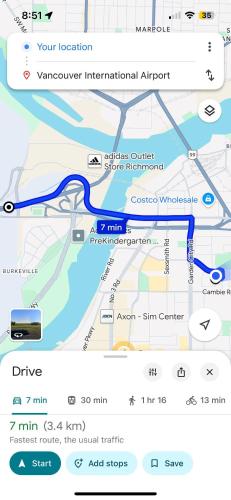 a screenshot of a map of a freeway at Vancouver airport 7mins away joy room in Richmond
