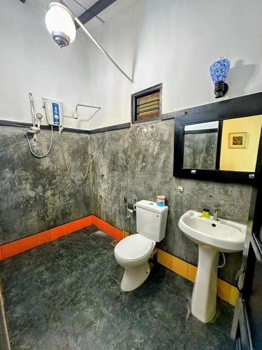 Koupelna v ubytování Hotel Sigiriya Kele
