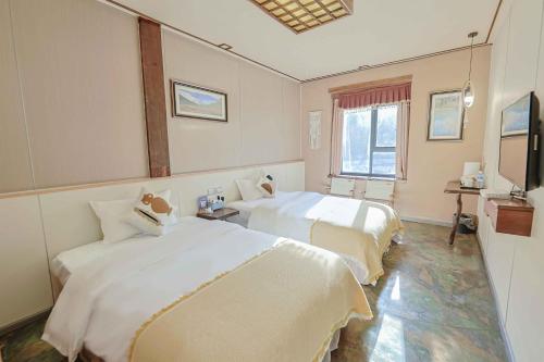 Gallery image of Daocheng Yading Shiruo Hotel in Daocheng