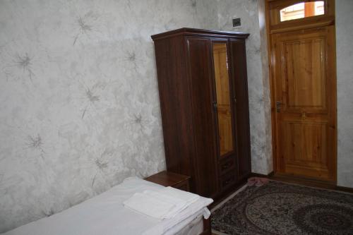 Katil atau katil-katil dalam bilik di Tilyakori Hotel