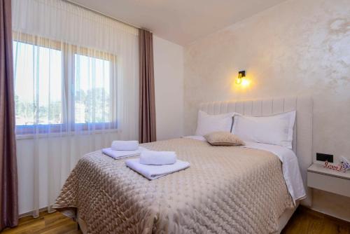 Postel nebo postele na pokoji v ubytování Grand View Holiday Home