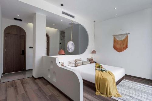 Xishuangbanna Verdant House Resort Hotelにあるベッド