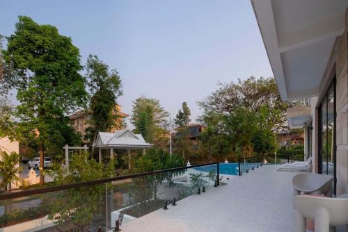 Xishuangbanna Verdant House Resort Hotelの敷地内または近くにあるプール