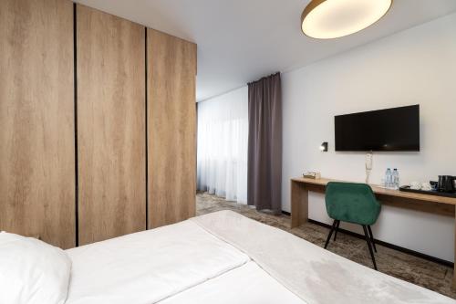 Postel nebo postele na pokoji v ubytování Hotel Biancas