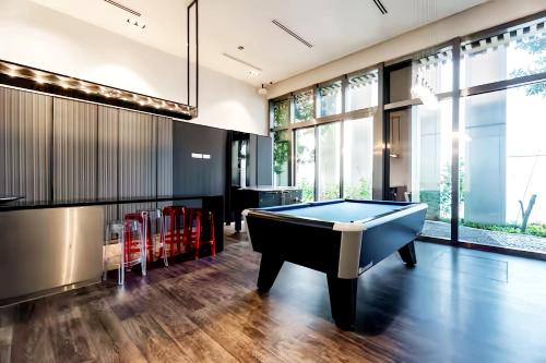 a billiard room with a pool table at Tropicana The Residence KLCC in Kuala Lumpur