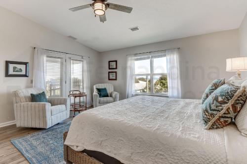a bedroom with a large bed and a window at 2505B W, 5th St condo in Fernandina Beach