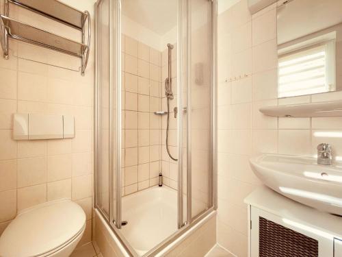 Koupelna v ubytování Bungalows am Buchenkampweg