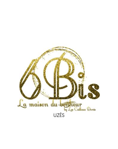 un logo d'or vintage pour un magasin de mode de dimium dans l'établissement Le 6 Bis by Les Cailloux Dorés, à Uzès