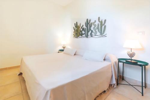 Ένα ή περισσότερα κρεβάτια σε δωμάτιο στο Residenza La Cicala