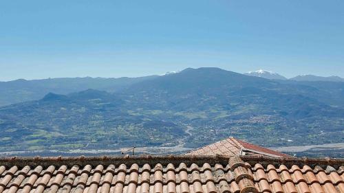 a view of a mountain range from a building at Clarus Mons in Chiaromonte