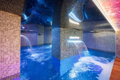 Bazén v ubytování Hotel Unik nebo v jeho okolí