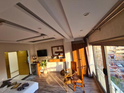 a living room with a couch and a table at tourist hotel cairo downtown in Cairo