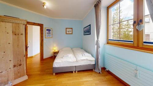 Postel nebo postele na pokoji v ubytování Apartment Domiziana