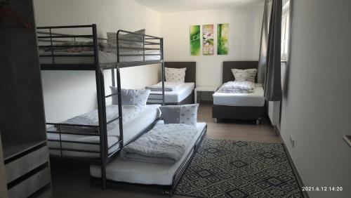 Postel nebo postele na pokoji v ubytování Gemütliche Wohnung an der Schweizer Grenze