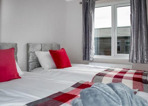 Ένα ή περισσότερα κρεβάτια σε δωμάτιο στο King Richards Country Lodges