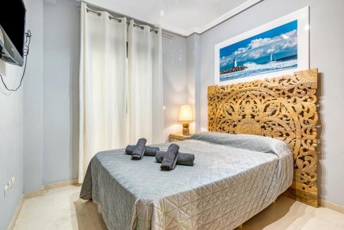 Ένα ή περισσότερα κρεβάτια σε δωμάτιο στο Sol Mar Arzuaga