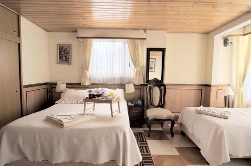 Postel nebo postele na pokoji v ubytování Hotel Inter Bogotá