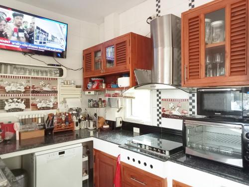 Kuchyň nebo kuchyňský kout v ubytování Homestay PJ Garden Home