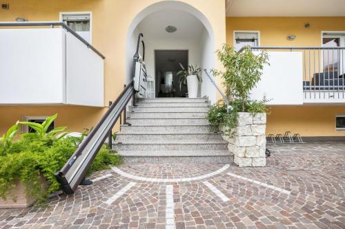 a set of stairs leading to a building at Agritur Laura in Nago-Torbole