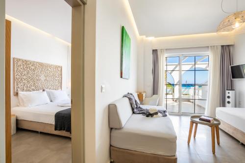 Postel nebo postele na pokoji v ubytování ALOS SUITES ex-Possirama Bay aparts