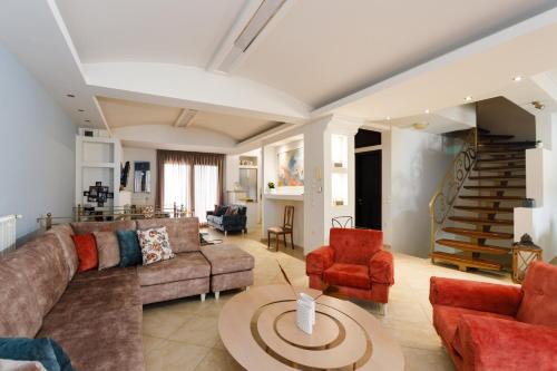 Posezení v ubytování Aphaia Home