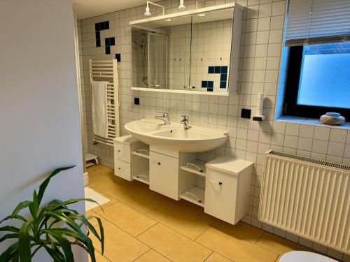 Et badeværelse på Ferienwohnung Linder Grube