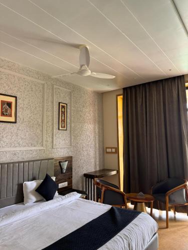 Postel nebo postele na pokoji v ubytování Sukoon Resort