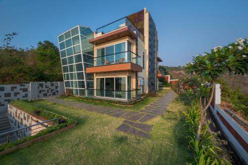 an aerial view of a house at SaffronStays Nautica in Harnai
