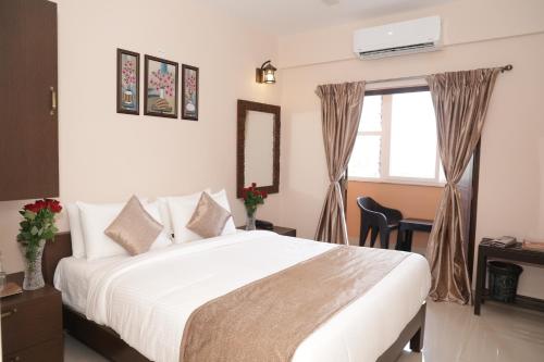 Postel nebo postele na pokoji v ubytování Nazri Hotel - Near Arambol Beach