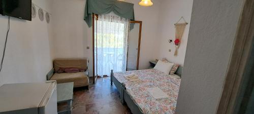 Imagine din galeria proprietății Roptro Rooms în Parga