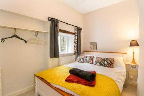 En eller flere senge i et værelse på Cherry Tree Cottage - 3 Bed Countryside Retreat!