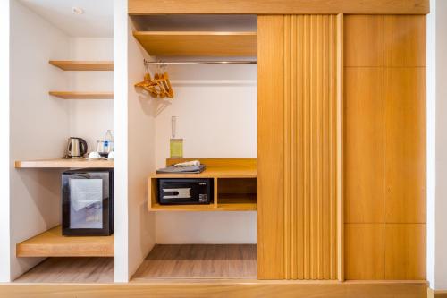 Una cocina o zona de cocina en Ayrest Hua Hin Hotel