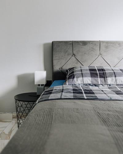 Ένα ή περισσότερα κρεβάτια σε δωμάτιο στο Allegra Apartments
