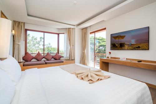 Cama o camas de una habitación en Ayrest Hua Hin Hotel