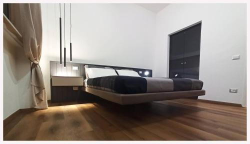 a bedroom with a bed in a room at Carneval and Tuscany in Viareggio